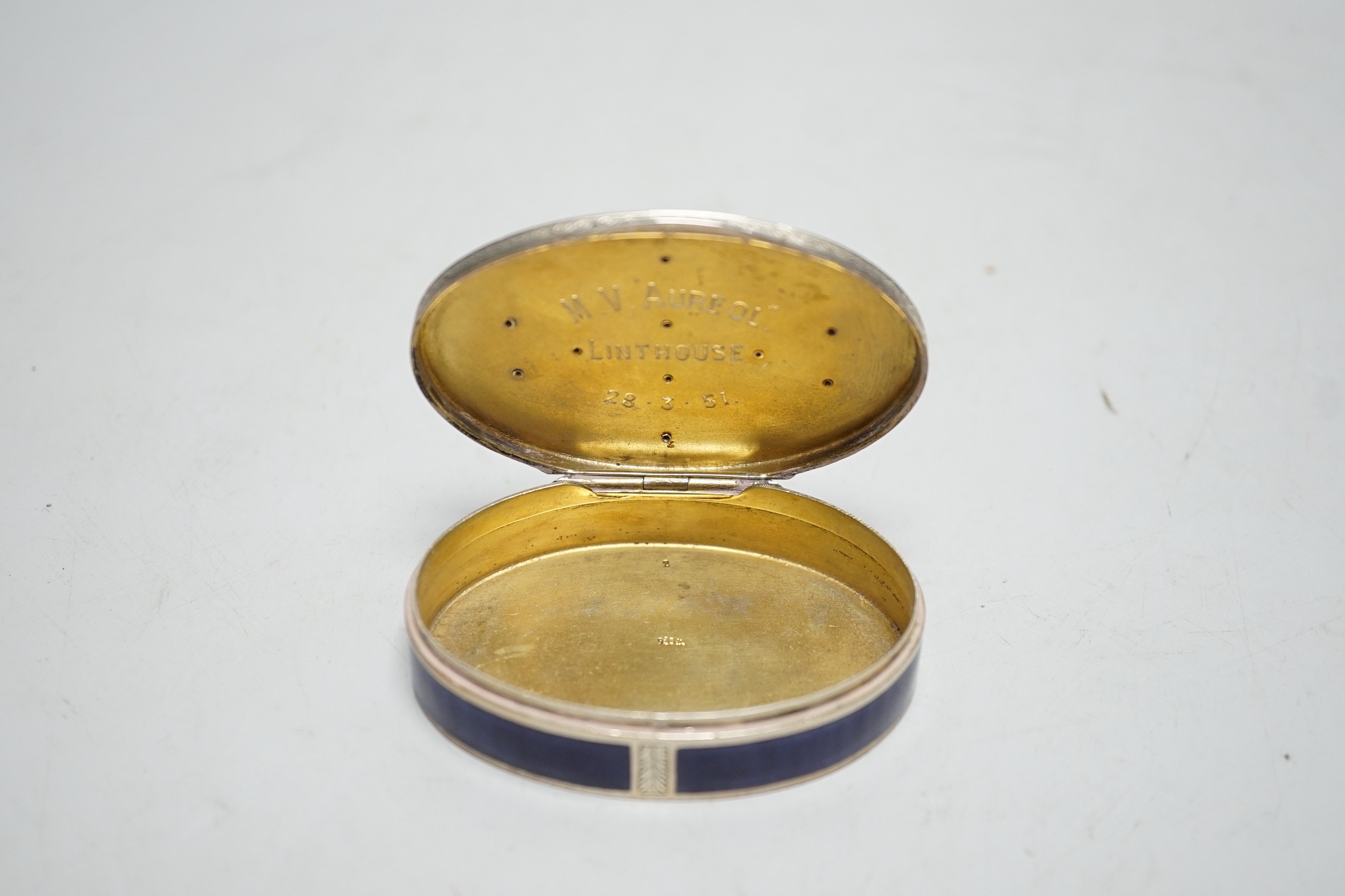 A 1920's continental 835 standard white metal, enamel and marcasite set oval box, 69mm.